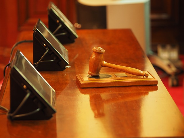 Wooden judge's gavel on desk, symbolizing authority and decision-making in legal matters